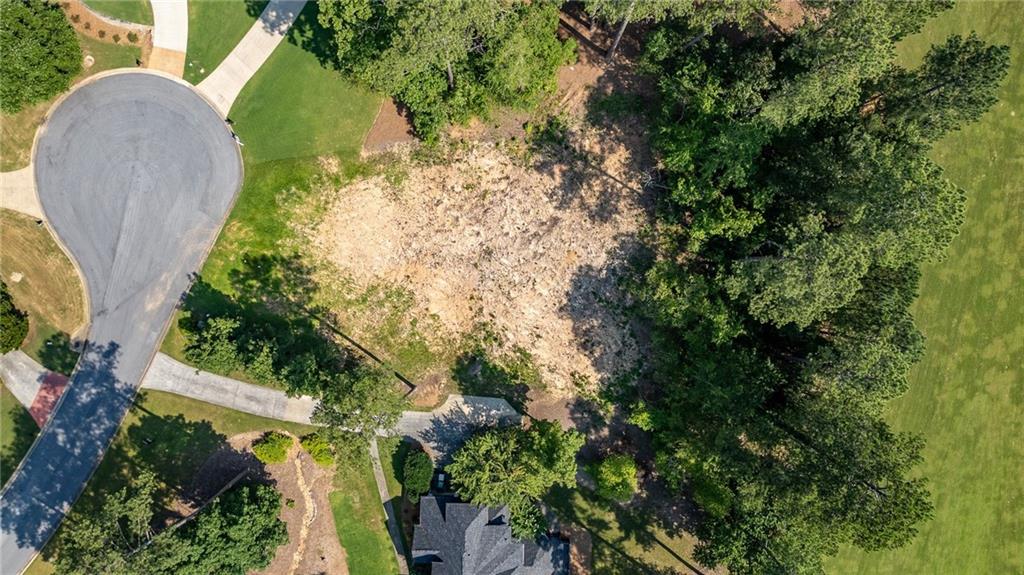 6 Irwin Court Northwest Rome, GA 30165 - Photo 10 of 33 an aerial view of a house with a yard and covered in backyard