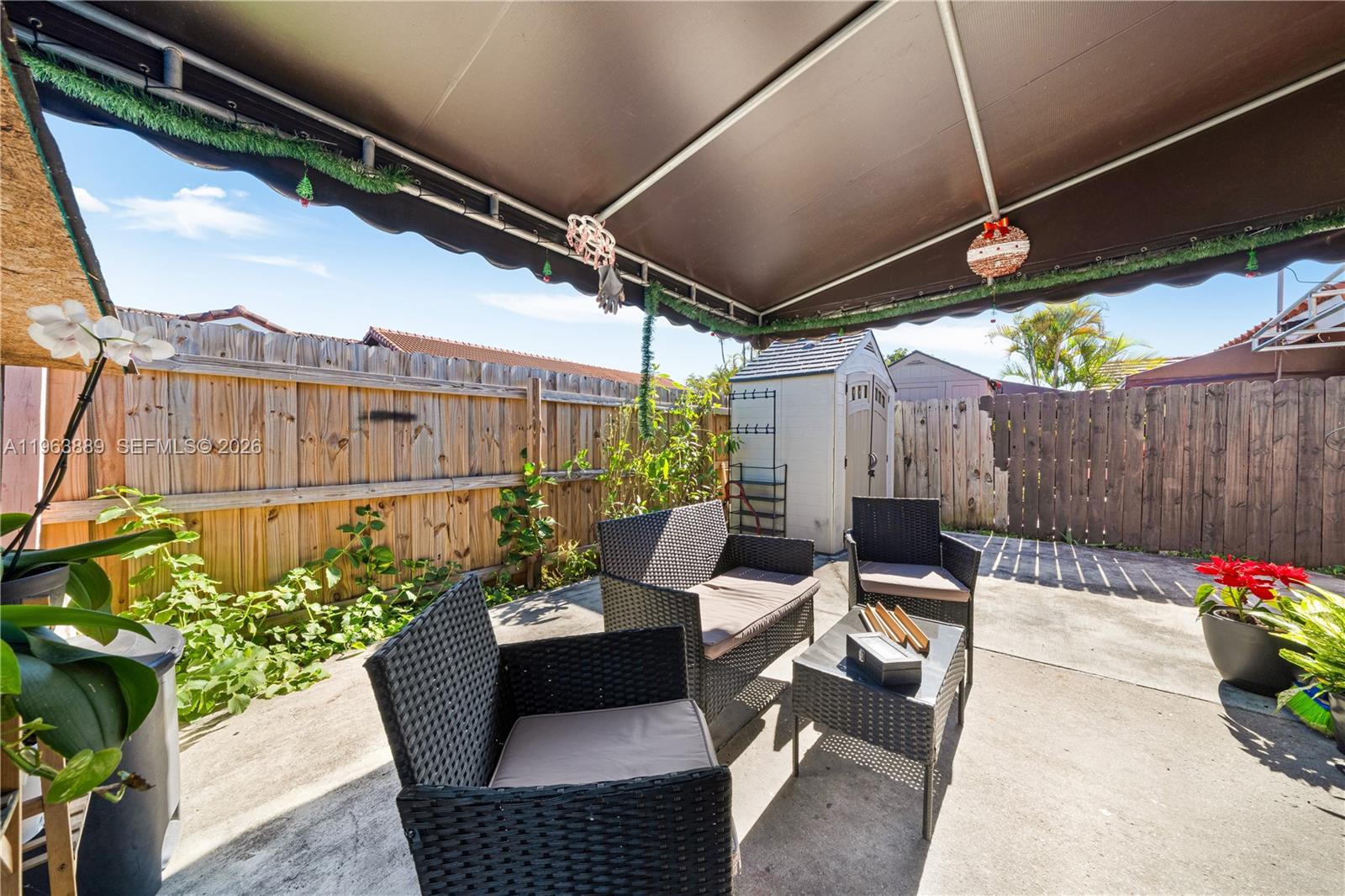 4531 Southwest 144th Avenue Miami, FL 33175 - Photo 14 of 24 a outdoor living space with furniture and a couch