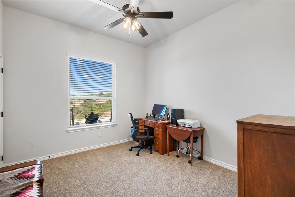 355 Sunset Cove Bluff Dale, TX 76433 - Photo 18 of 40 a view of a workspace with furniture and a window