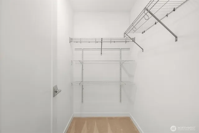 a view of a room with racks on the wall