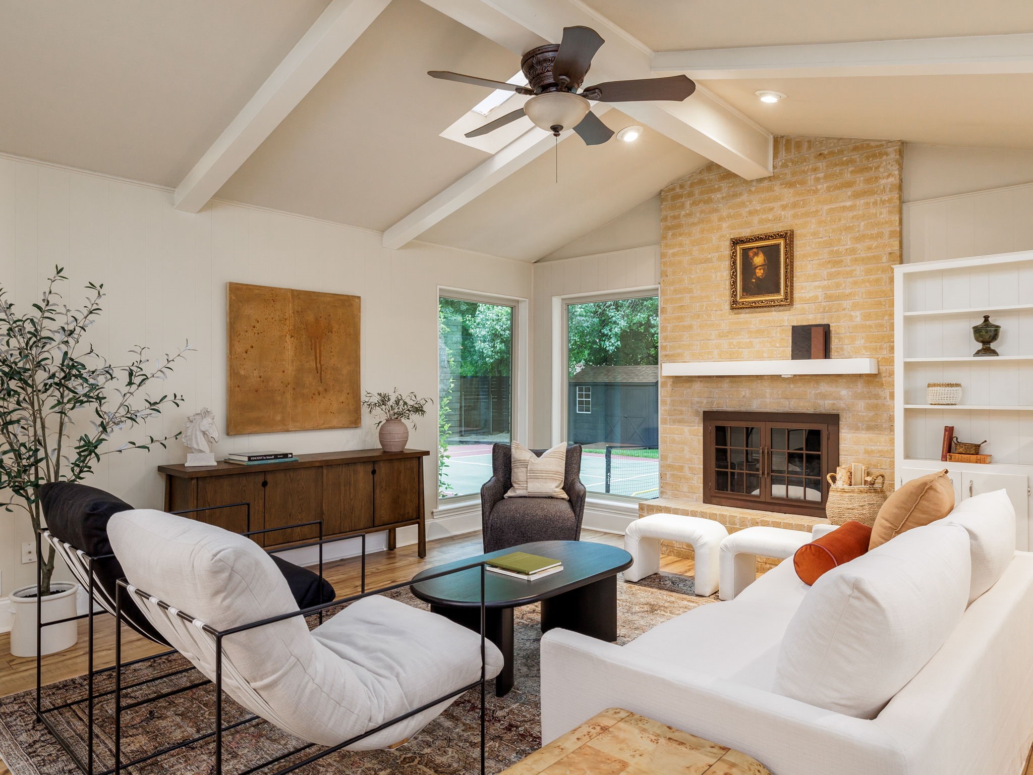 2501 Comburg Castle Way Austin, TX 78748 - Photo 1 of 1 Sunken living with exposed brick fireplace and columns.