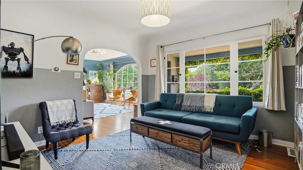 270 Clinton Street Pasadena, CA 91103 - Photo 24 of 75 a living room with furniture and a large window