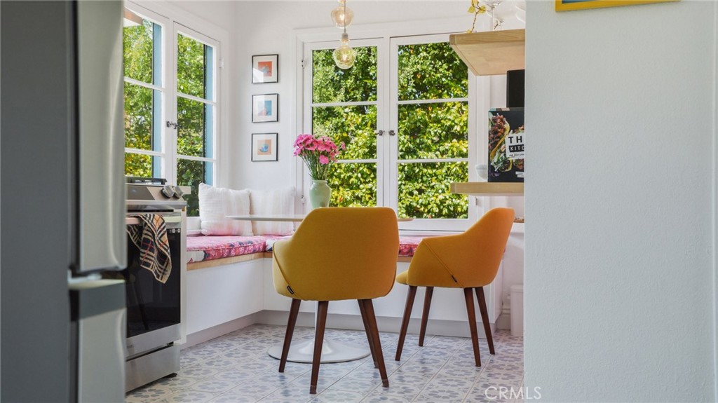 270 Clinton Street Pasadena, CA 91103 - Photo 25 of 75 a view of a dining room with furniture window and outside view