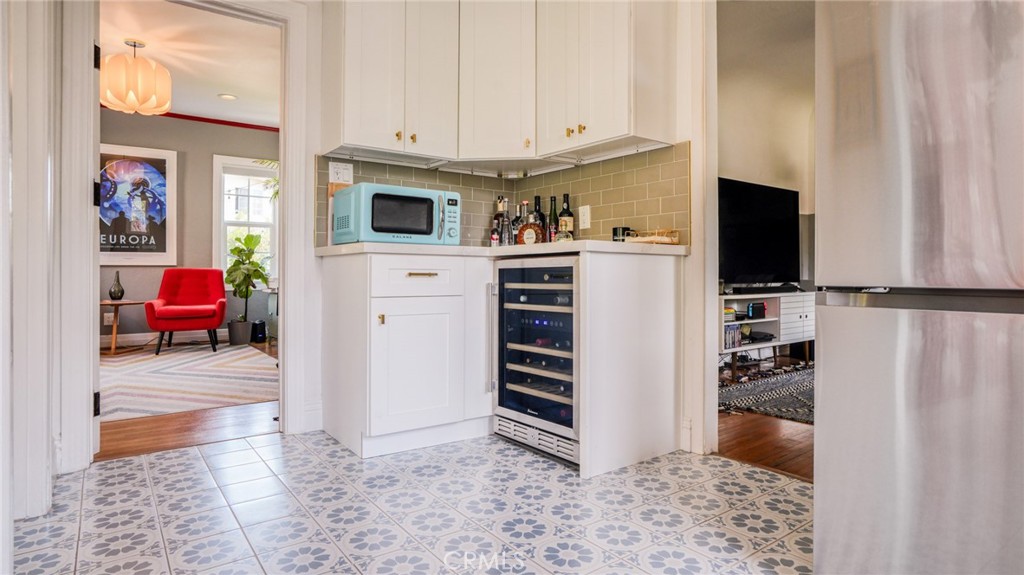270 Clinton Street Pasadena, CA 91103 - Photo 36 of 75 a view of kitchen with stainless steel appliances granite countertop a refrigerator and a stove top oven
