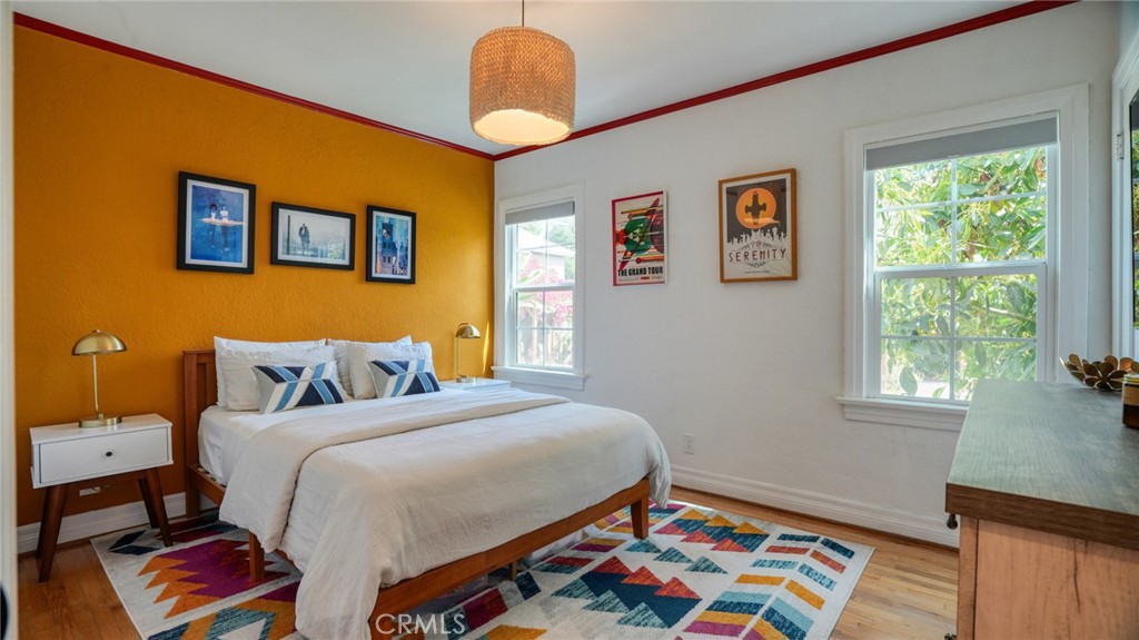 270 Clinton Street Pasadena, CA 91103 - Photo 44 of 75 a bedroom with a bed and a window