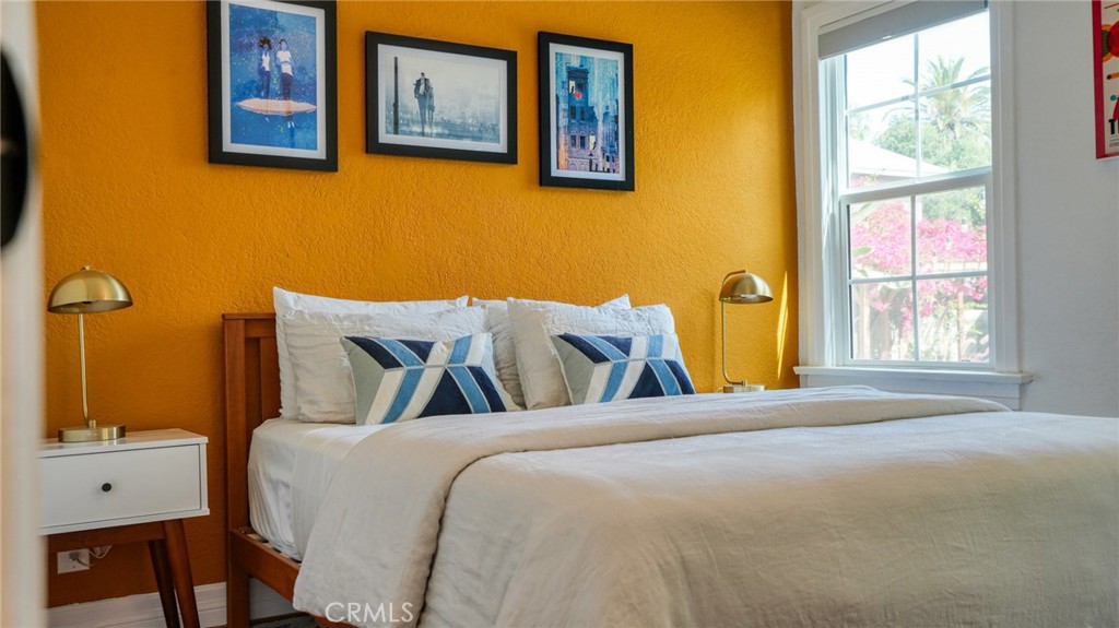 270 Clinton Street Pasadena, CA 91103 - Photo 45 of 75 a bed sitting in a bedroom next to a window