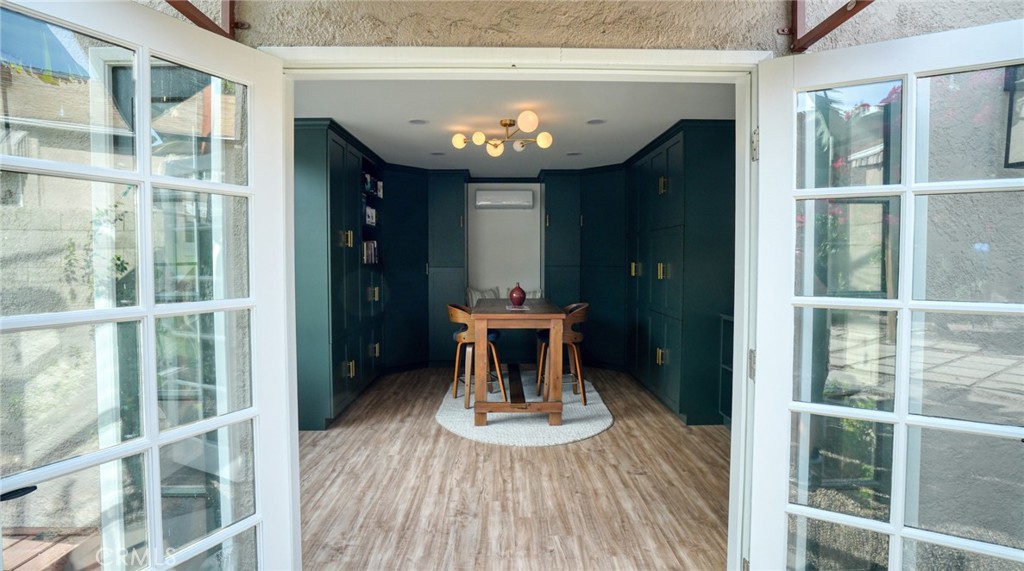 270 Clinton Street Pasadena, CA 91103 - Photo 56 of 75 a room with chandelier fan and windows