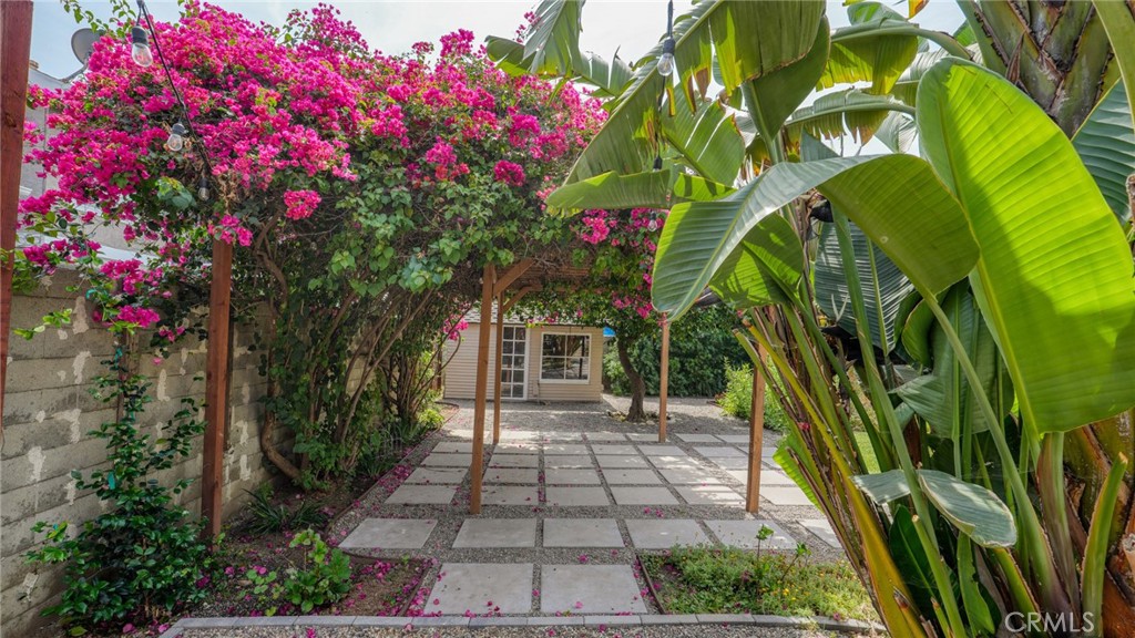270 Clinton Street Pasadena, CA 91103 - Photo 62 of 75 a view of a house with a flower garden