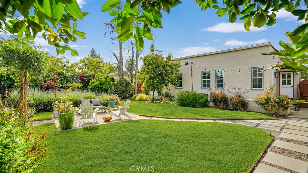 270 Clinton Street Pasadena, CA 91103 - Photo 74 of 75 a front view of a house with a yard