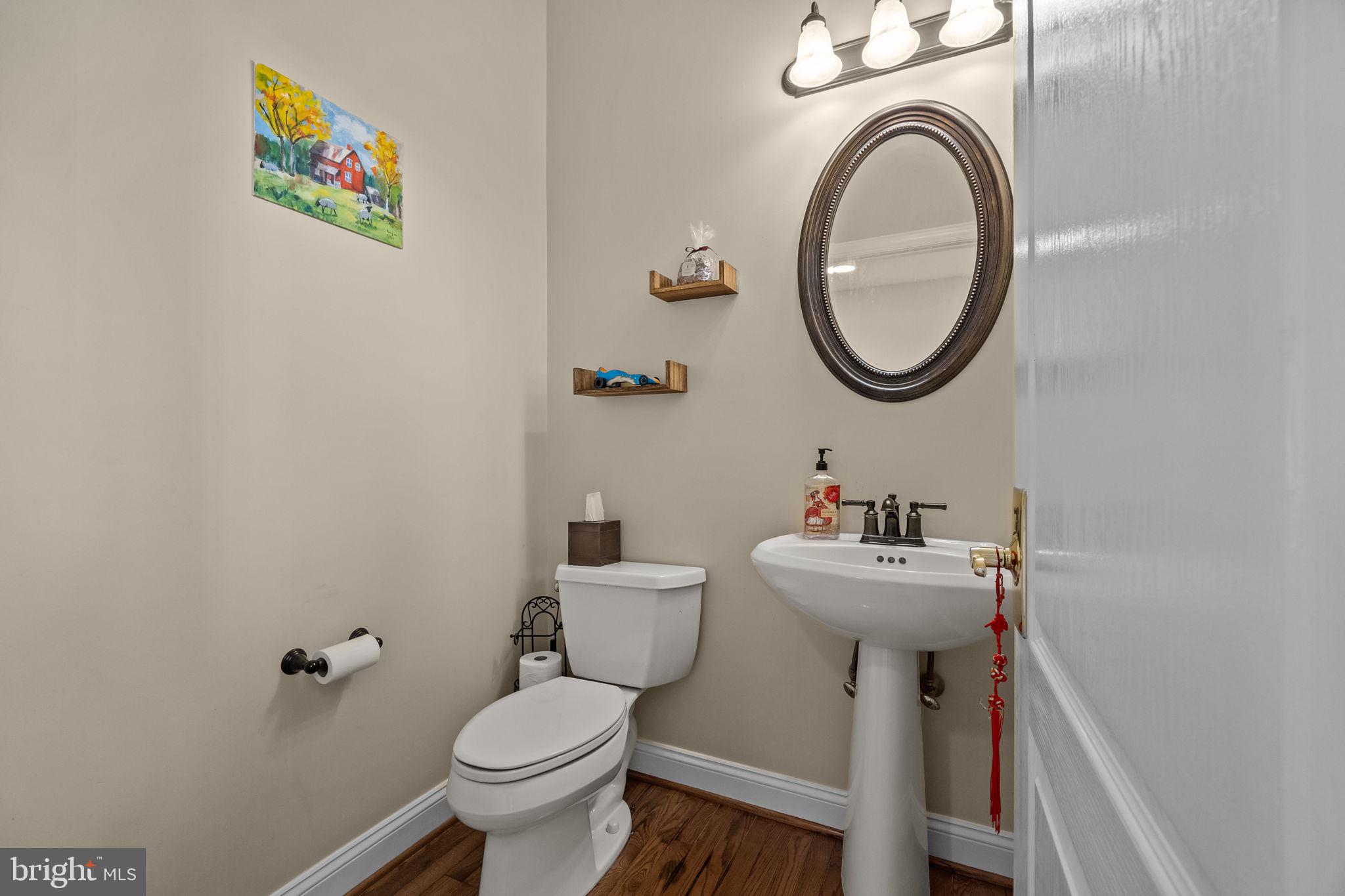 3689 Hancock Lane Doylestown, PA 18902 - Photo 15 of 78 a bathroom with a sink mirror and toilet