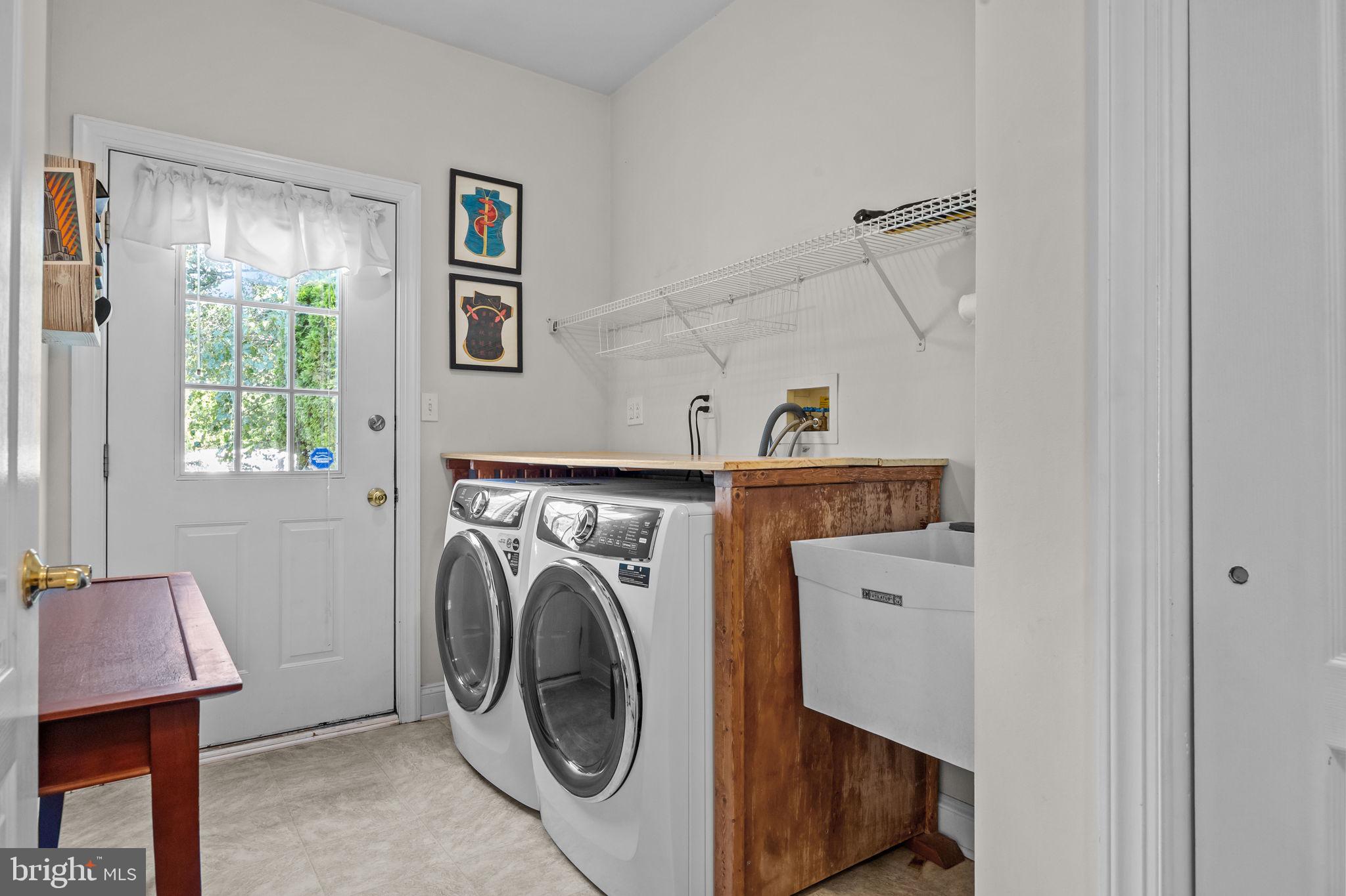 3689 Hancock Lane Doylestown, PA 18902 - Photo 31 of 78 1st floor laundry with access to garage and yard