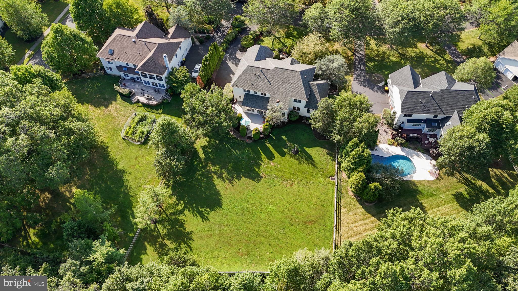 3689 Hancock Lane Doylestown, PA 18902 - Photo 75 of 78 an aerial view of residential house with swimming pool and lawn chairs