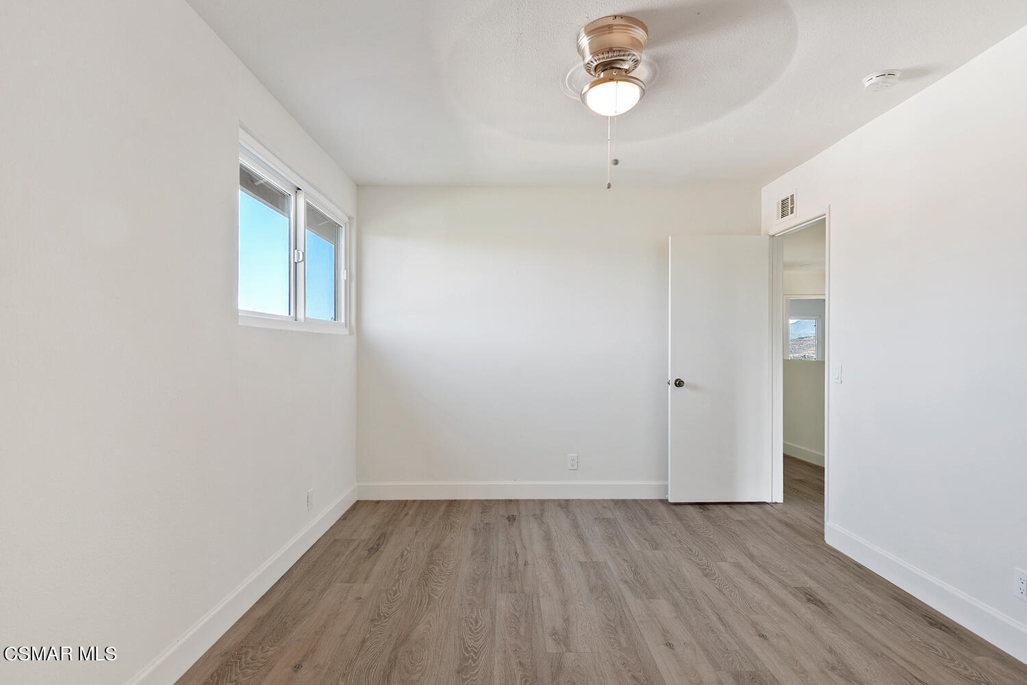 224 Cedar Heights Drive Thousand Oaks, CA 91360 - Photo 21 of 27 a view of a room with wooden floor and fan