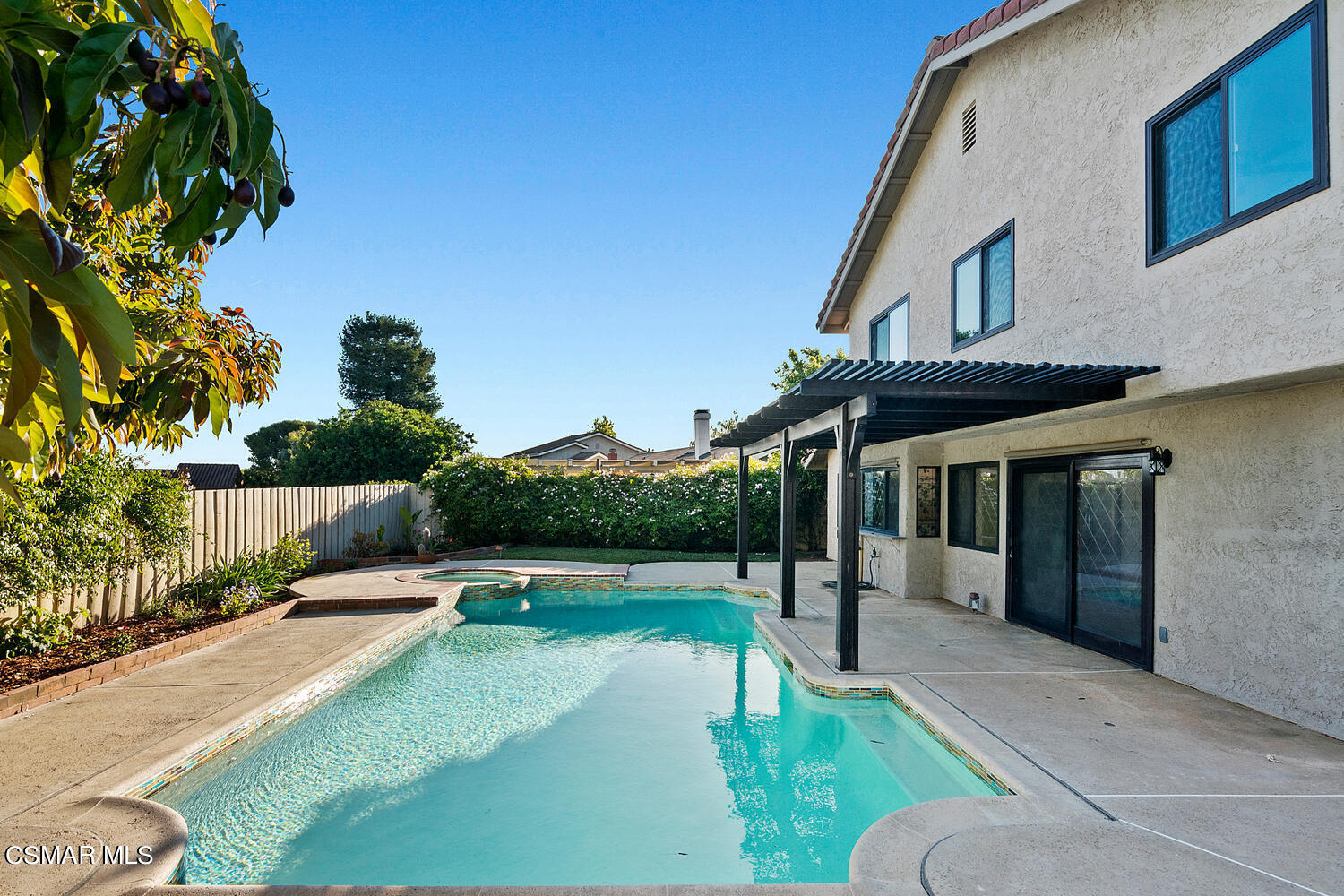 224 Cedar Heights Drive Thousand Oaks, CA 91360 - Photo 25 of 27 a swimming pool with barbeque oven in front of it