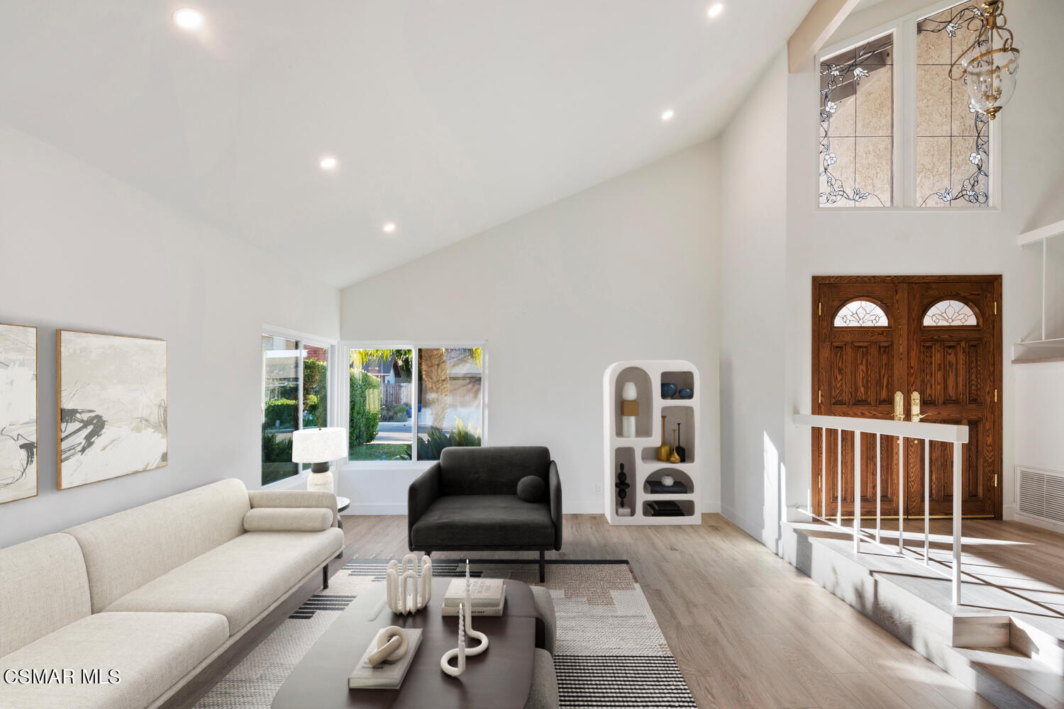 224 Cedar Heights Drive Thousand Oaks, CA 91360 - Photo 3 of 27 a living room with furniture and a flat screen tv