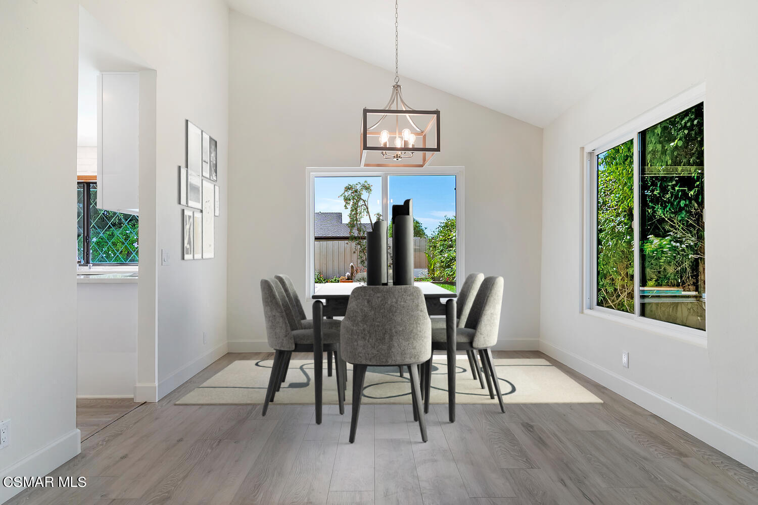 224 Cedar Heights Drive Thousand Oaks, CA 91360 - Photo 6 of 27 a view of a dining room with furniture window and wooden floor