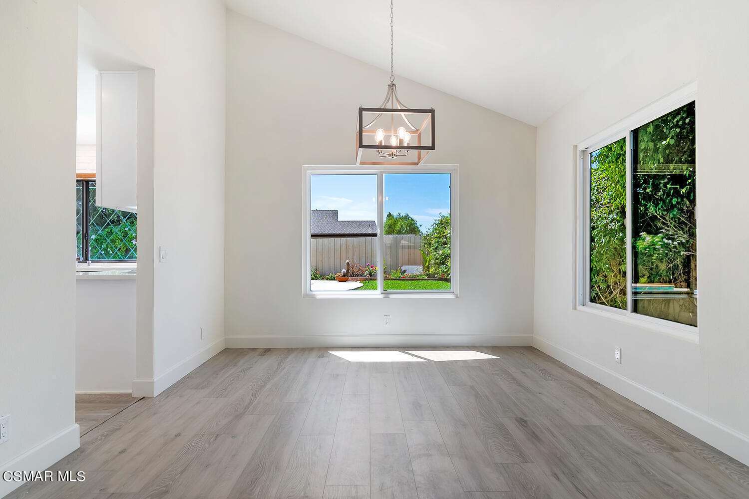 224 Cedar Heights Drive Thousand Oaks, CA 91360 - Photo 10 of 27 a view of an empty room with a window and wooden floor