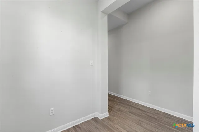 a view of small space with wooden floor