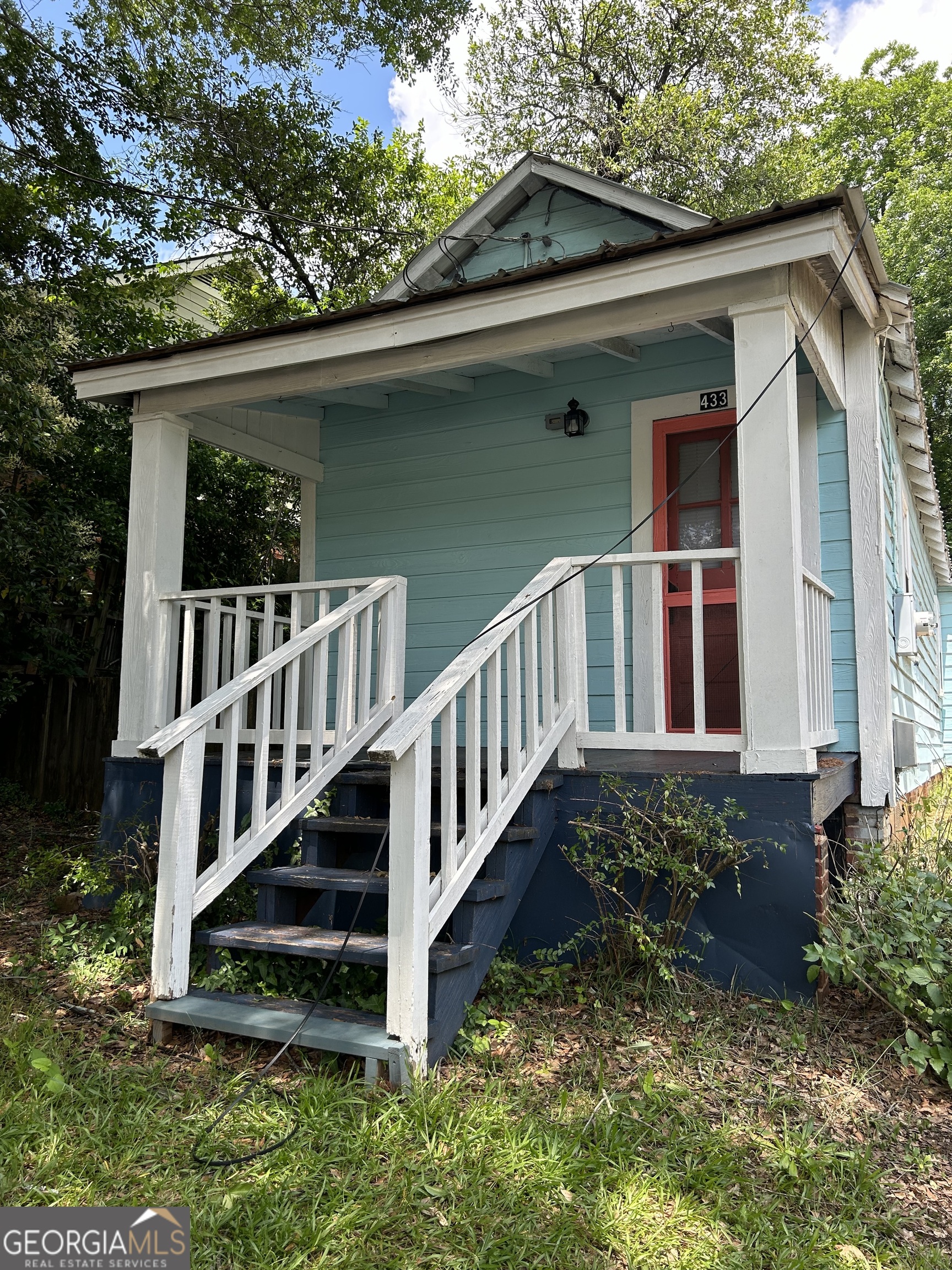 433 South Rocksprings Street Athens, GA 30605 - Photo 2 of 14 a view of a wooden house with a yard