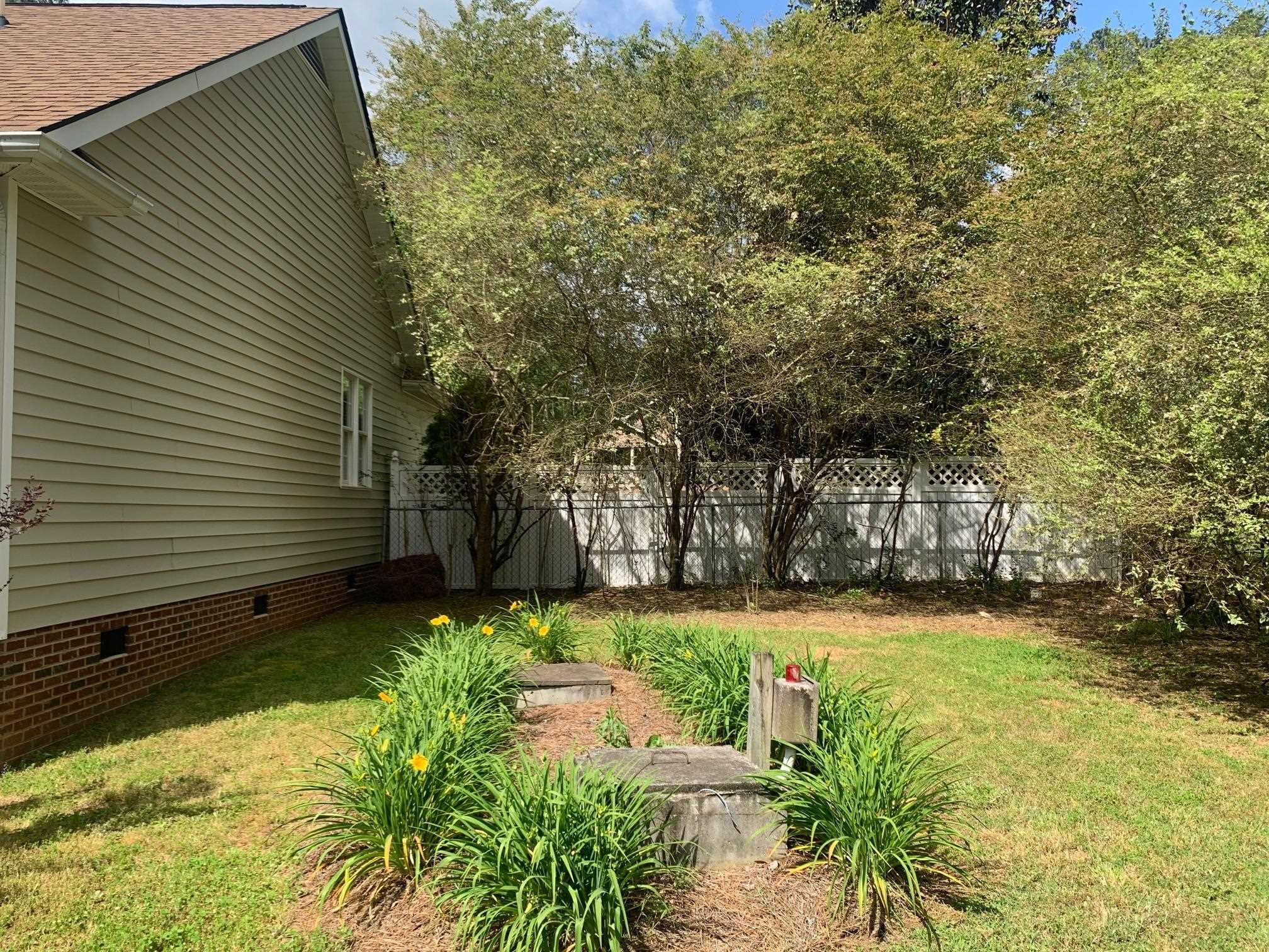 126 Sacred Fire Road Louisburg, NC 27549 - Photo 20 of 27 Side Landscaping