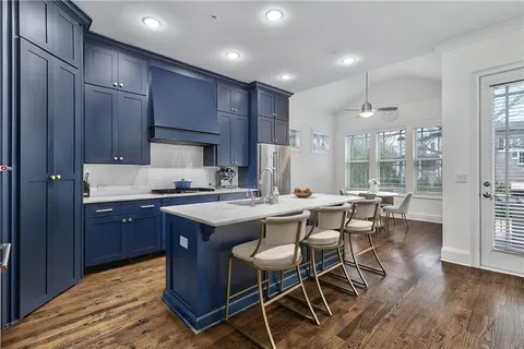 a white bath tub sitting in a bathroom