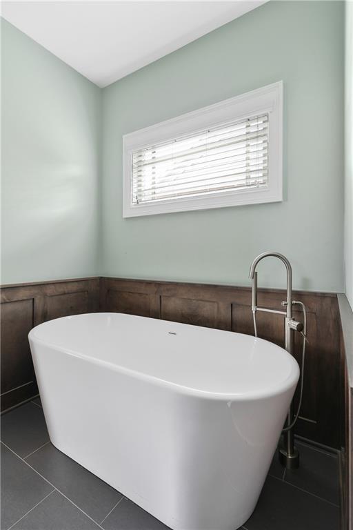 333 Patterson Way N East Atlanta, GA 30312 - Photo 32 of 47 a white bath tub sitting in a bathroom