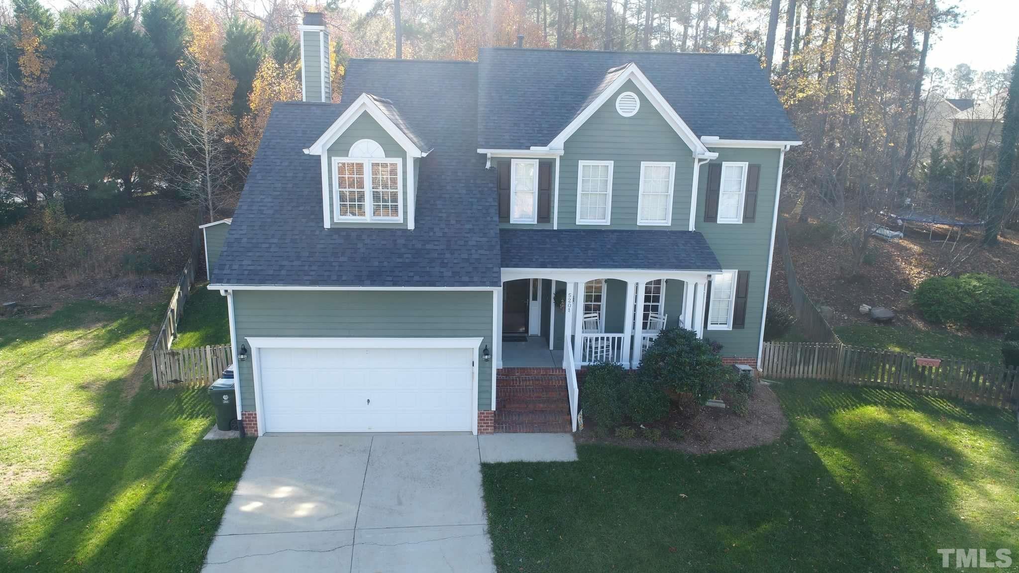 5201 Halcott Court Raleigh, NC 27613 - Photo 54 of 55 front view of house with a yard