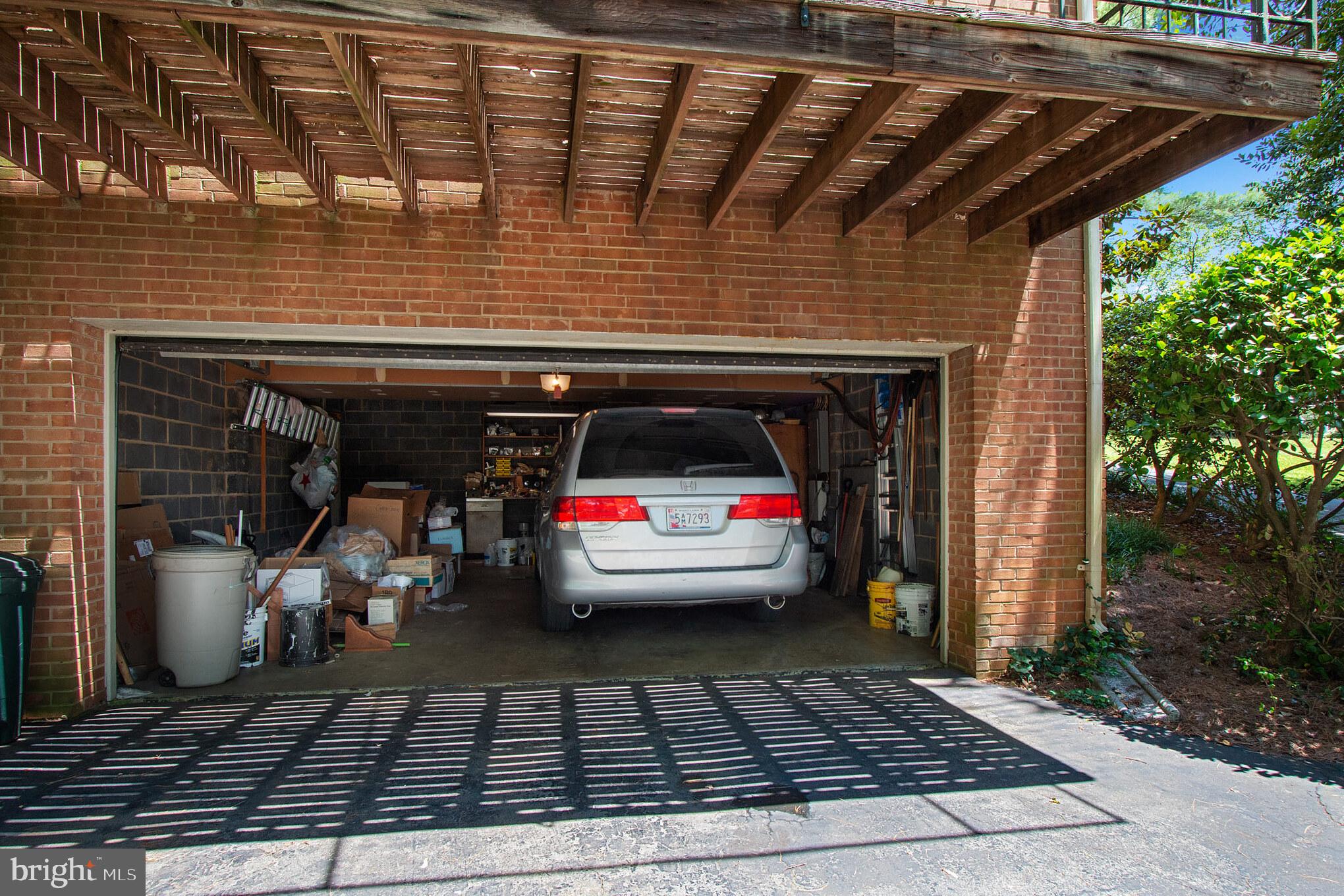11708 Gregerscroft Road Potomac, MD 20854 - Photo 25 of 28 2 car garage from the back of home