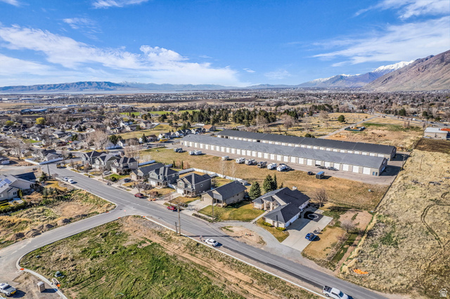1836 West 800 North Mapleton, UT 84663 - Photo 35 of 38 Aerial view of residential area with a mountainous background