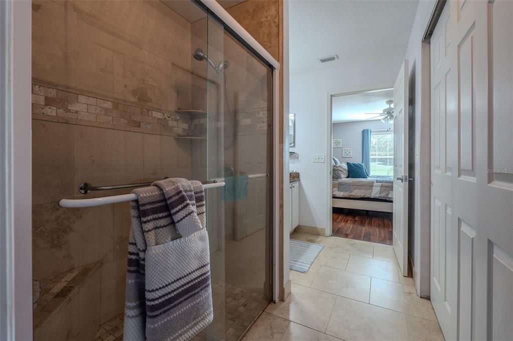 15143 Southwest 14th Avenue Road Ocala, FL 34473 - Photo 24 of 53 a bathroom with a sink and mirror
