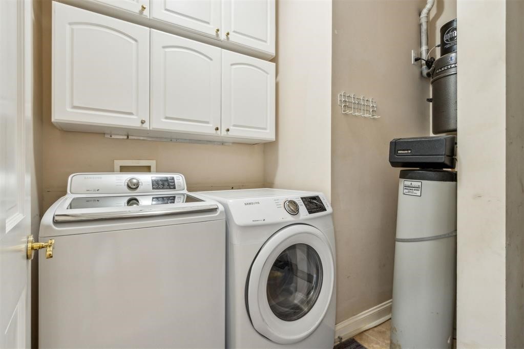 3119 Sea Marsh Road Fernandina Beach, FL 32034 - Photo 19 of 41 a utility room with dryer and washer