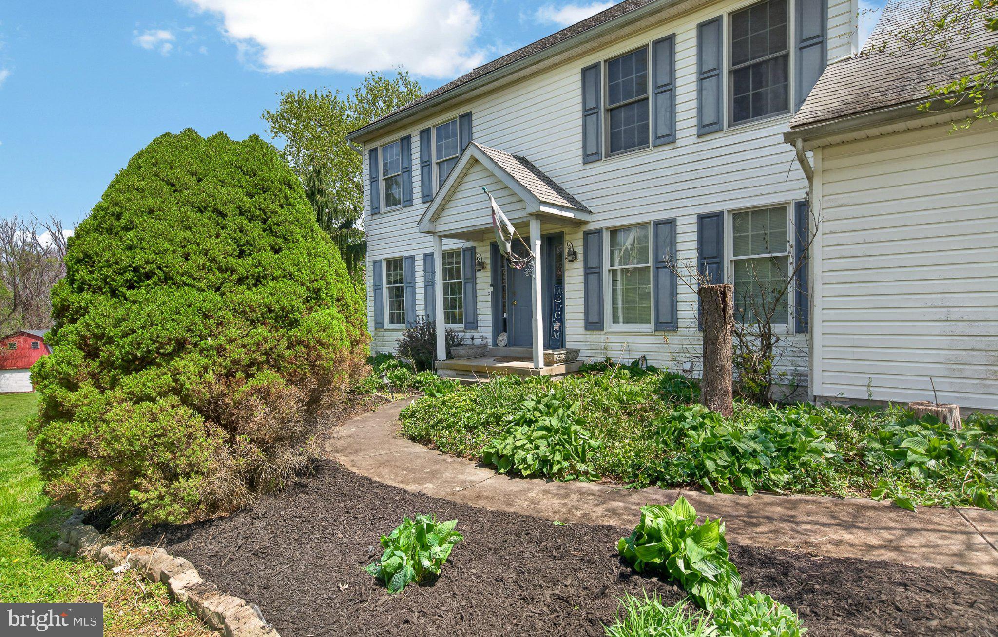 45 Latham Road Nottingham, PA 19362 - Photo 7 of 83 Charming home with lush landscaping.