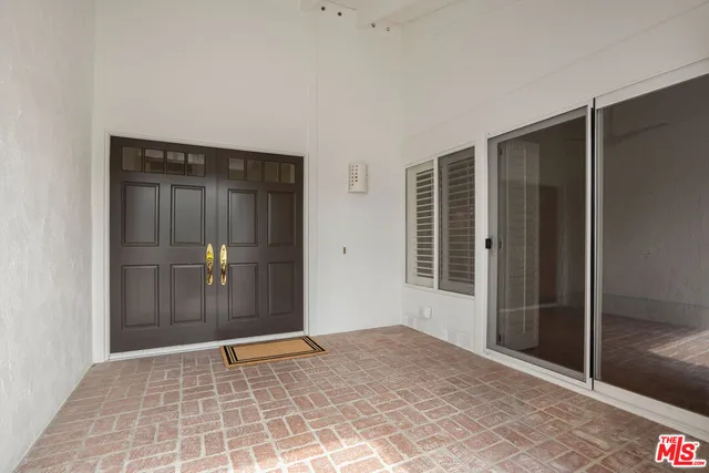 a view of entryway with stairs and furniture