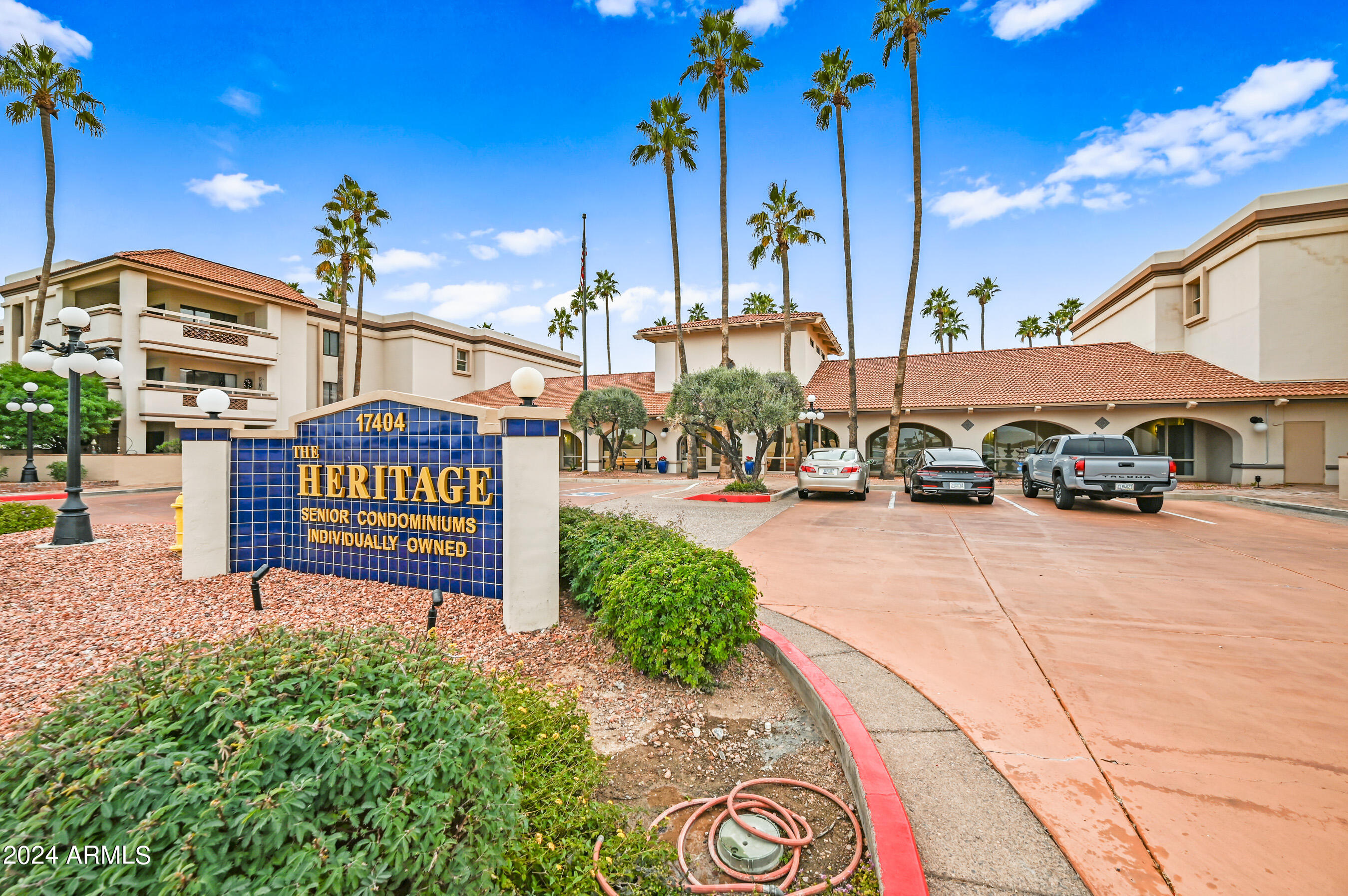 17404 North 99th Avenue, Unit 338 Sun City, AZ 85373 - Photo 1 of 27 a sign on the side of a building