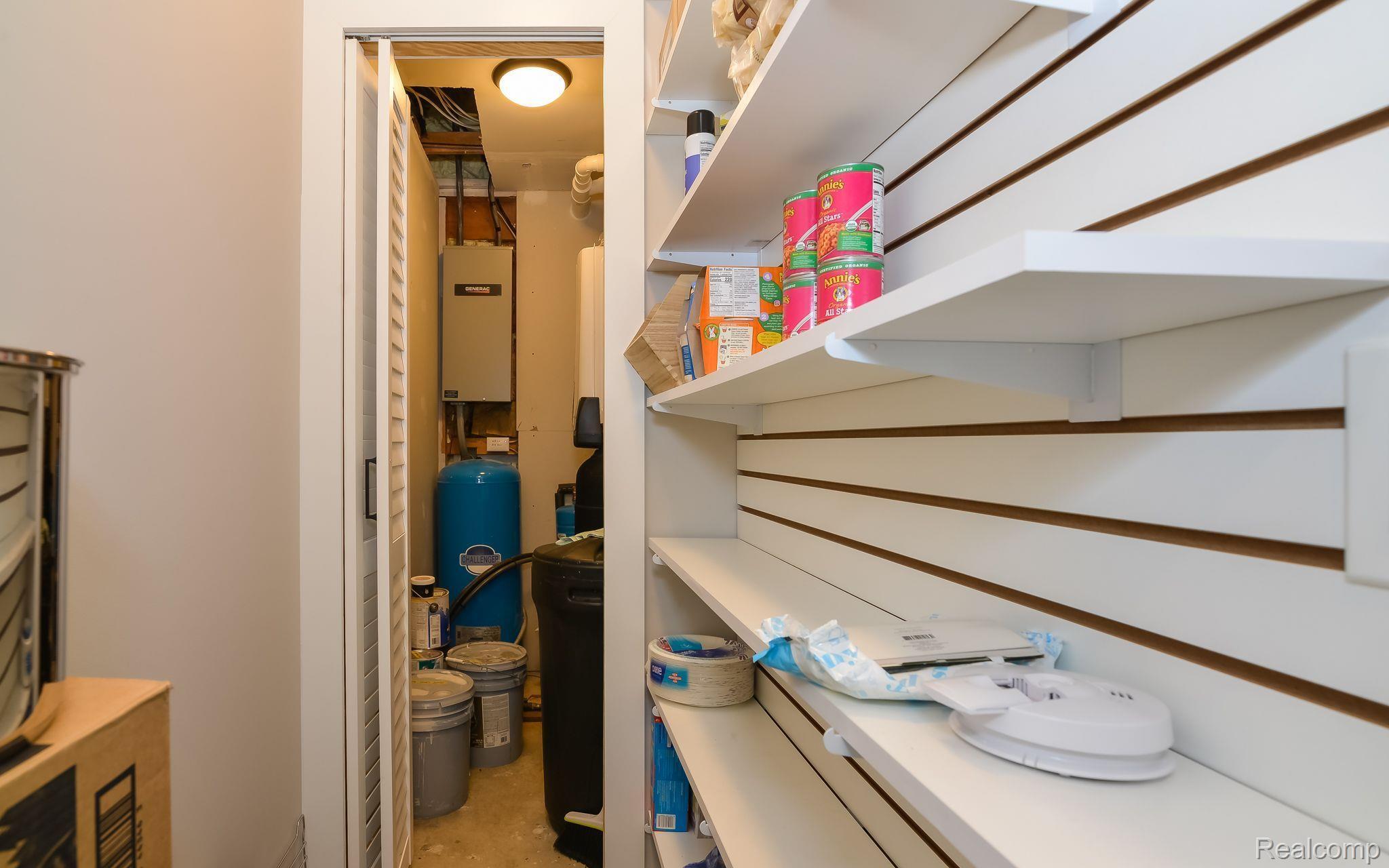 15204 Bishop Road Byron, MI 48418 - Photo 26 of 38 Pantry leads to RO system, tankless hot water heat