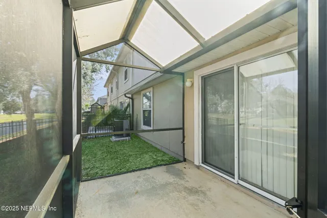 a view of a porch with a backyard