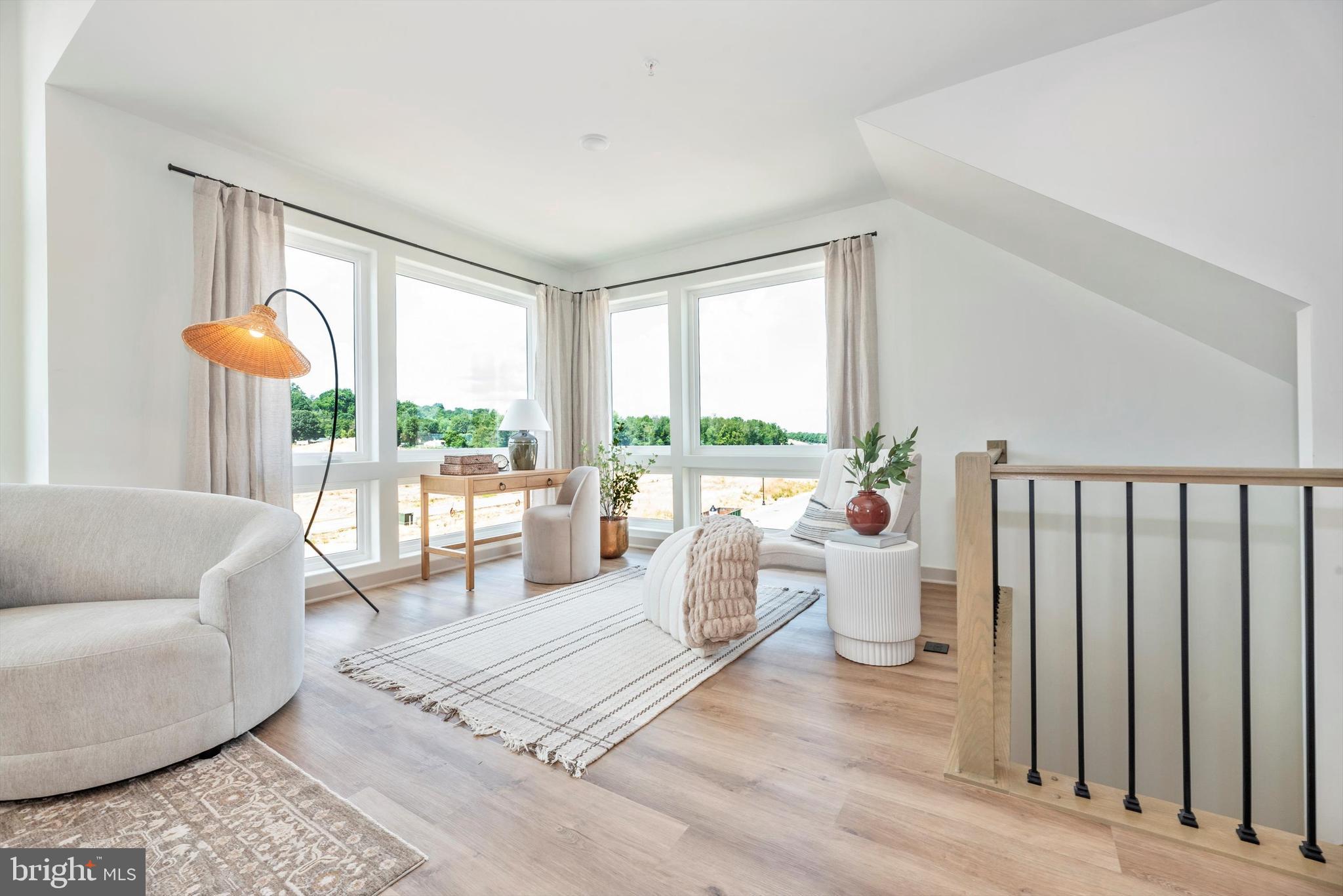 710 Iron Frg Road Frederick, MD 21702 - Photo 13 of 49 a living room with furniture and a large window