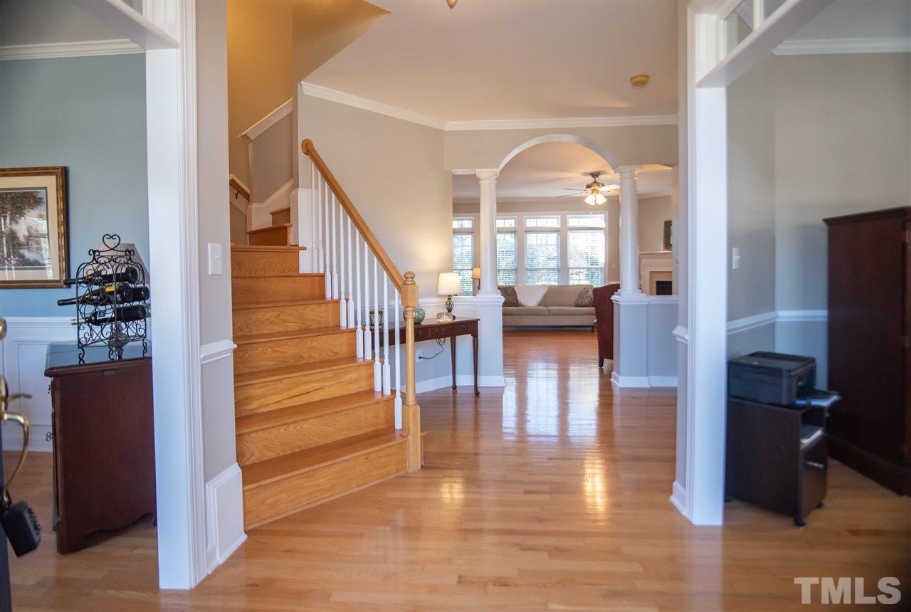 12417 Draco Road Raleigh, NC 27614 - Photo 4 of 30 Gorgeous archway creates a grand entryway into the family room.