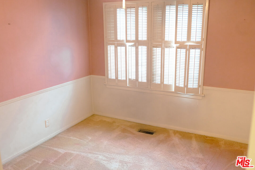 Undisclosed Address Los Angeles, CA 90066 - Photo 12 of 27 an empty room with a window