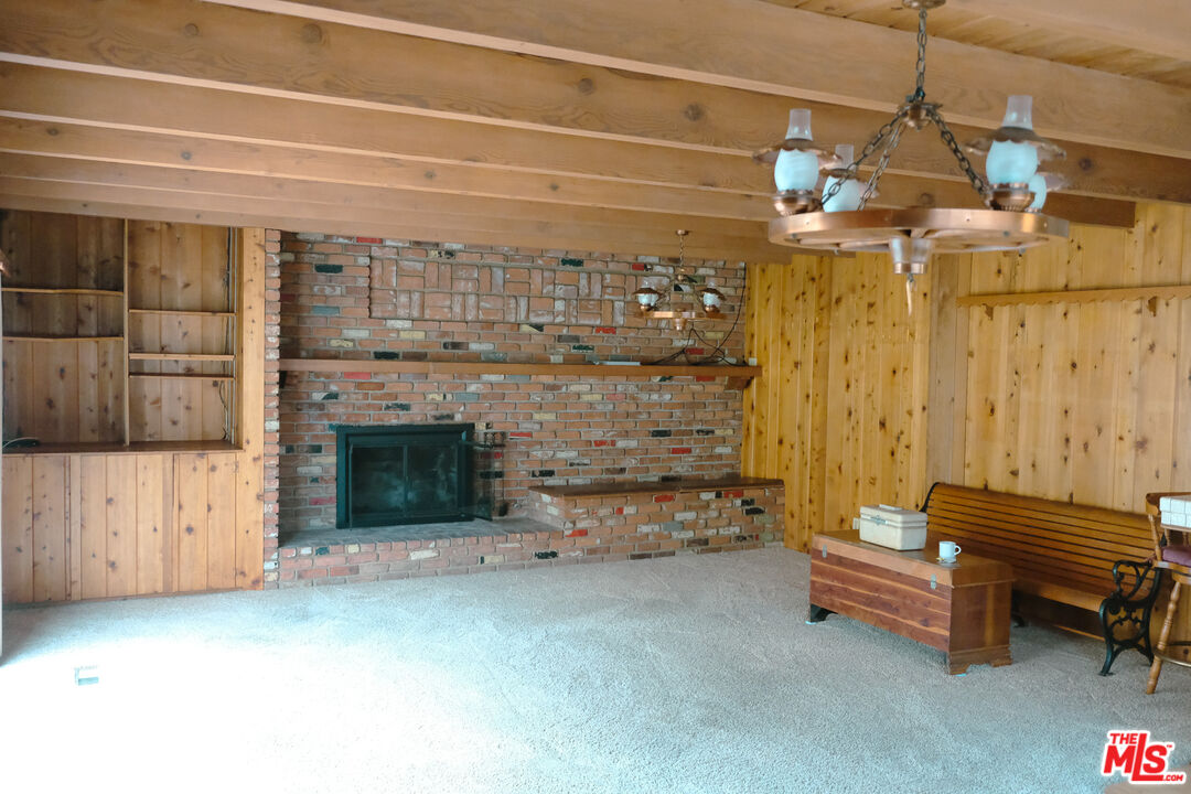 Undisclosed Address Los Angeles, CA 90066 - Photo 5 of 27 a living room with furniture and a fireplace
