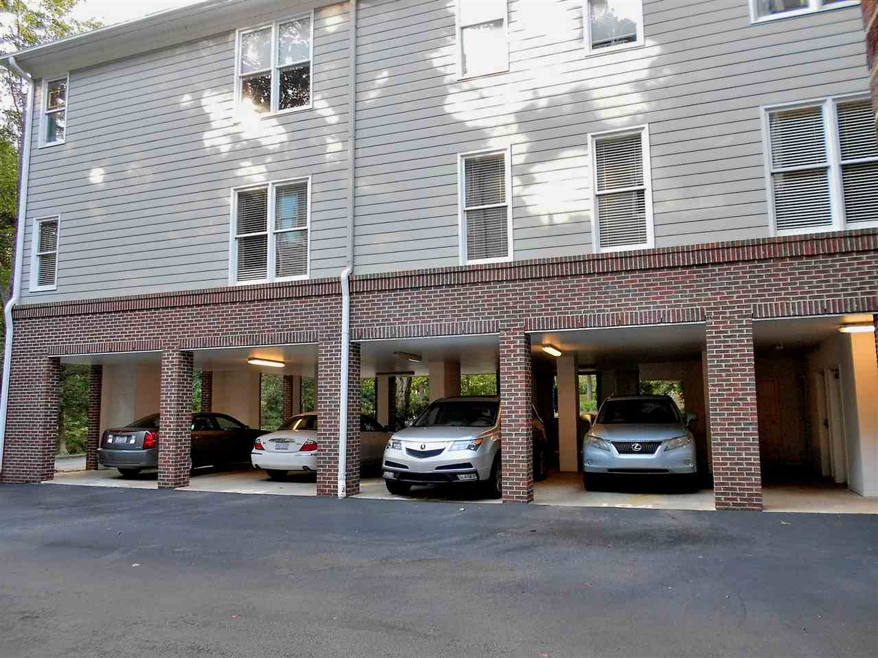 3701 Holly Lane, Unit 201 Raleigh, NC 27612 - Photo 26 of 27 ...is two cars deep on the lower level, with elevator access to upper floors Covered Parking