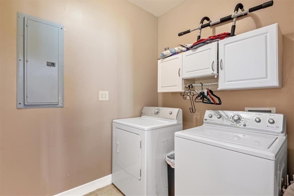 37 Heather Circle Cave Spring, GA 30124 - Photo 13 of 32 a utility room with dryer and washer