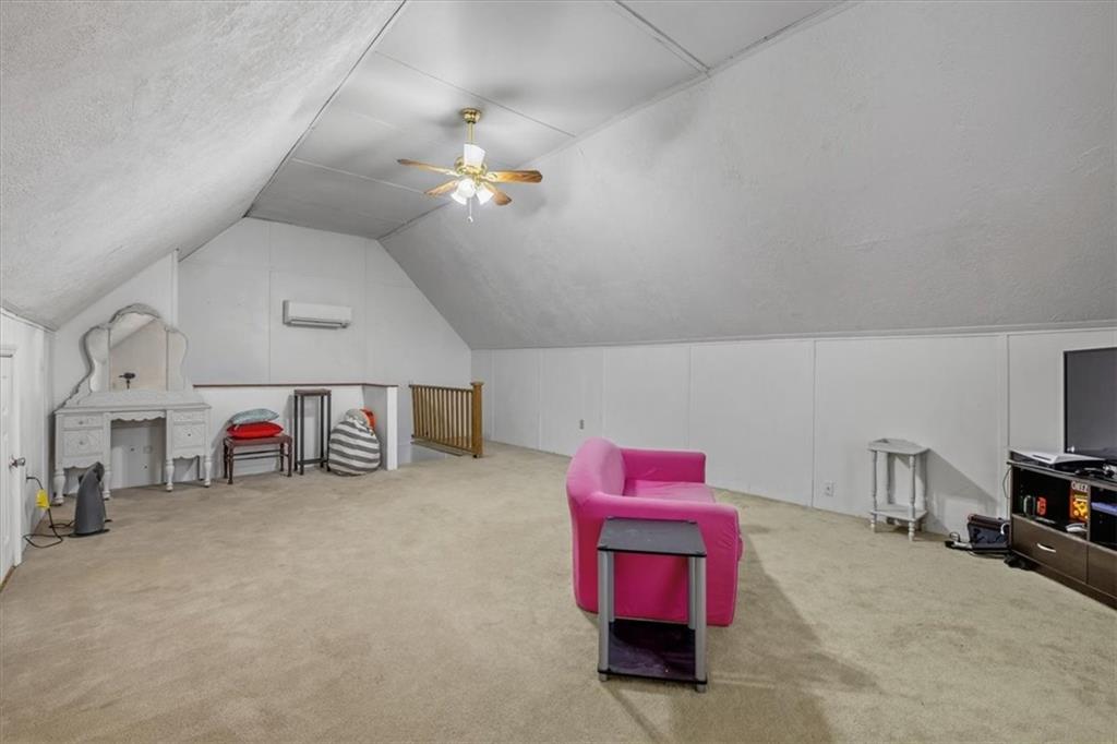37 Heather Circle Cave Spring, GA 30124 - Photo 24 of 32 a view of a room with furniture and a chandelier