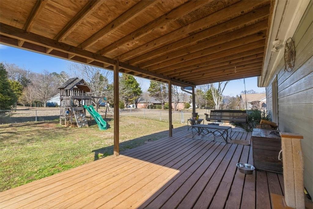 37 Heather Circle Cave Spring, GA 30124 - Photo 25 of 32 a patio with wooden floor and outdoor space