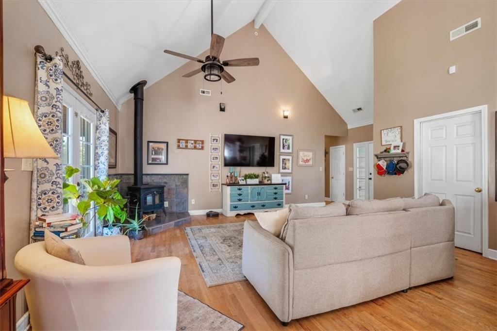 37 Heather Circle Cave Spring, GA 30124 - Photo 6 of 32 a living room with furniture and a flat screen tv