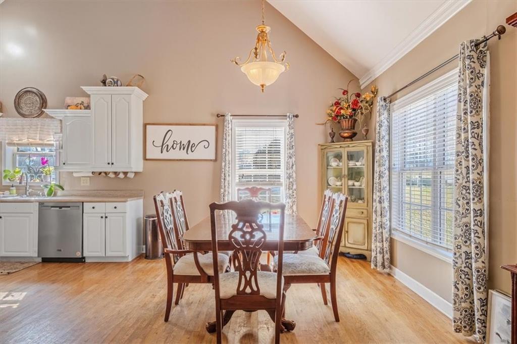 37 Heather Circle Cave Spring, GA 30124 - Photo 8 of 32 a view of a dining room with furniture window and wooden floor