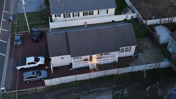 a kitchen with stainless steel appliances granite countertop a stove microwave and cabinets