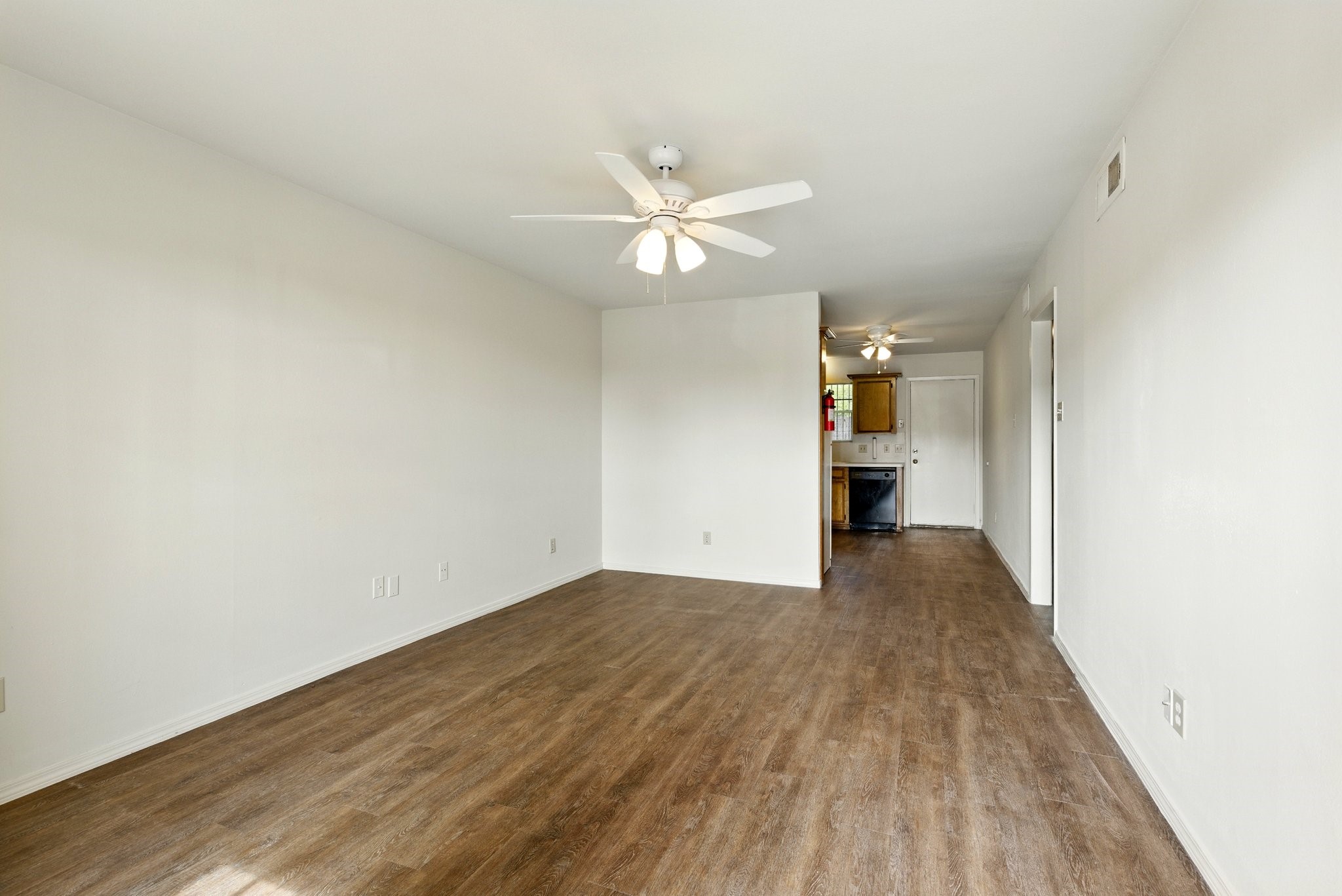 9410 Edgebrook Drive Houston, TX 77075 - Photo 2 of 11 wooden floor in an empty room