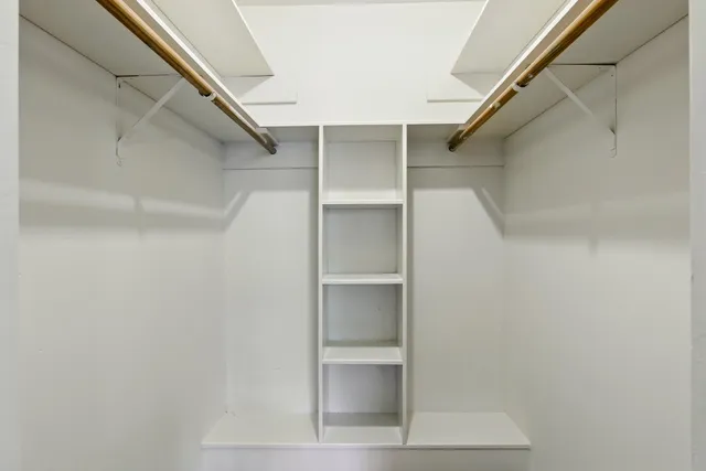 a view of an empty walk in closet