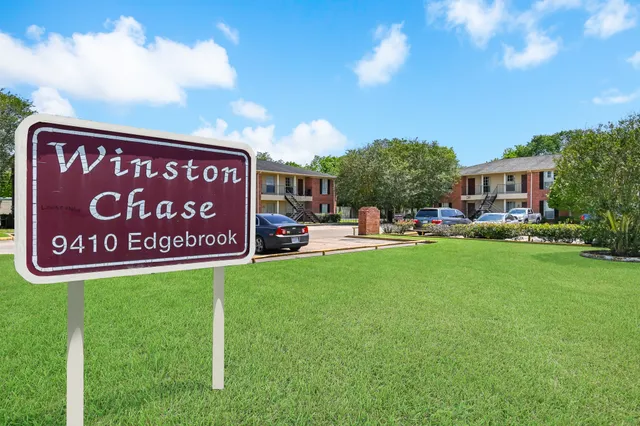 a sign that is sitting in the grass